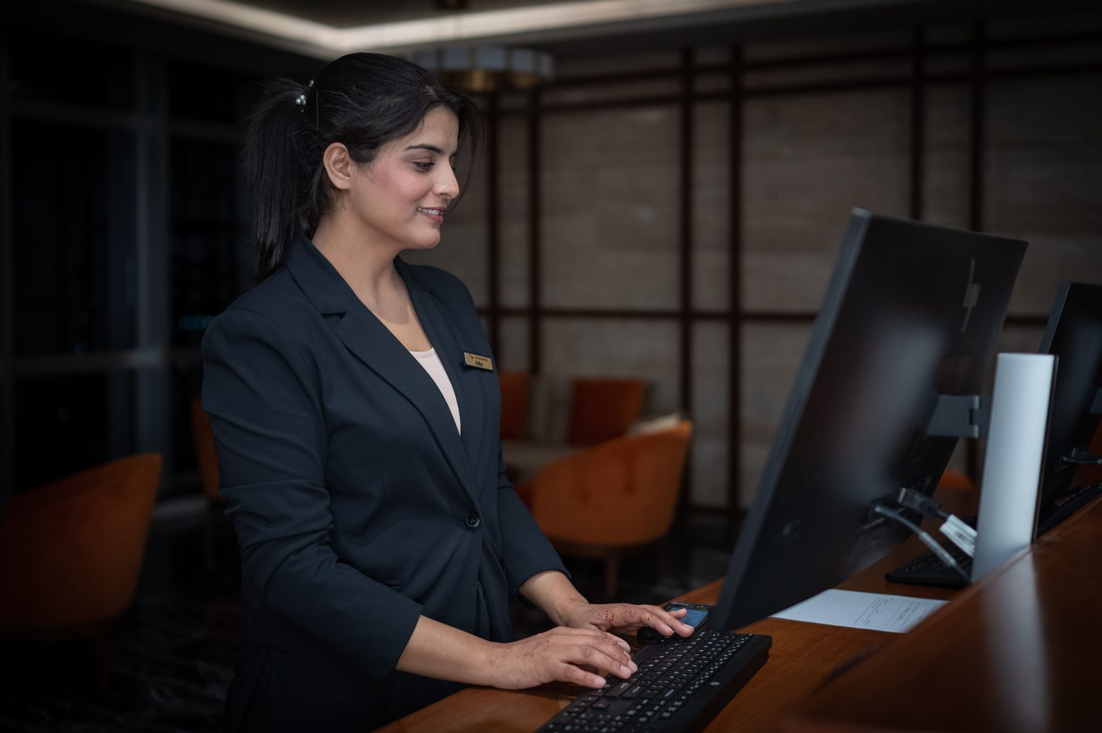 Hospitality professional using a property technology workstation