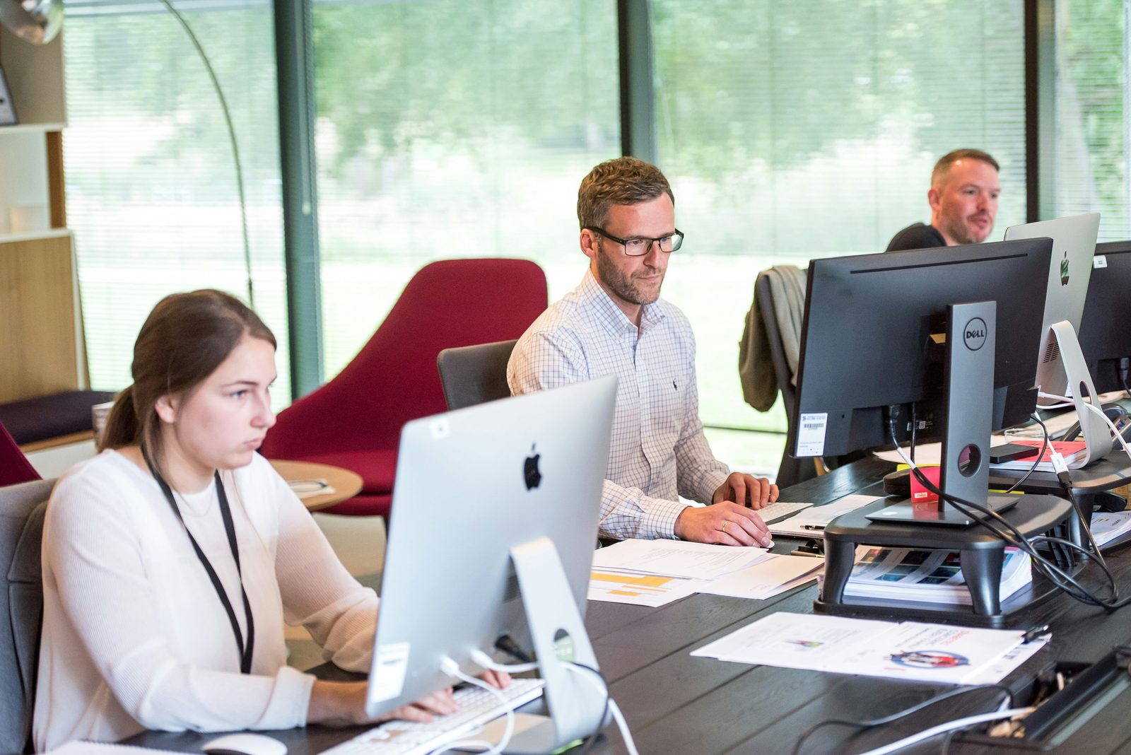 IT professionals working together in an office environment